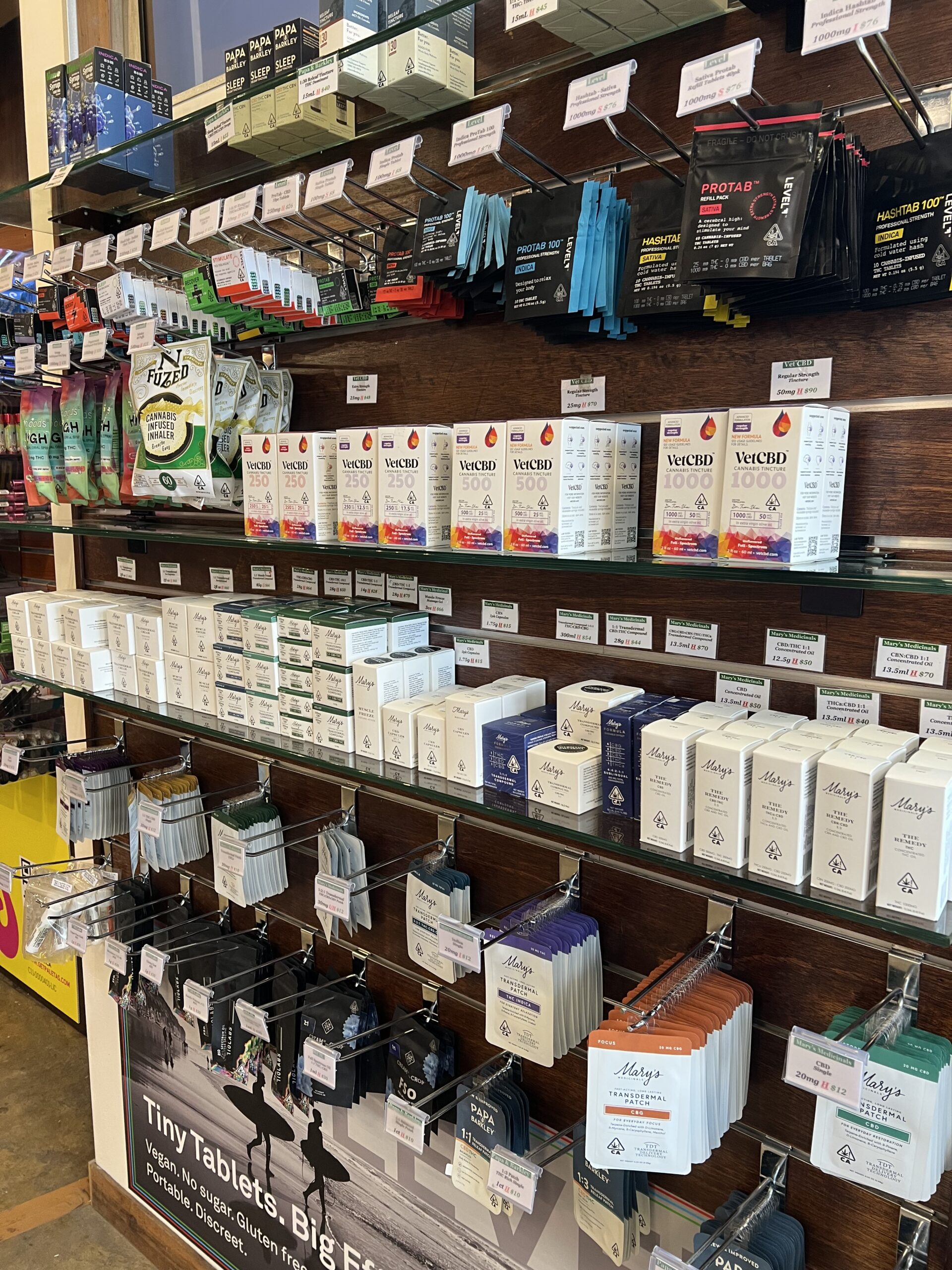 Shelves displaying various packaged health and wellness products in a retail setting